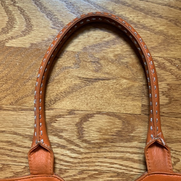 Cole Hahn orange handbag with fringe and silver hardware. - Picture 9 of 16